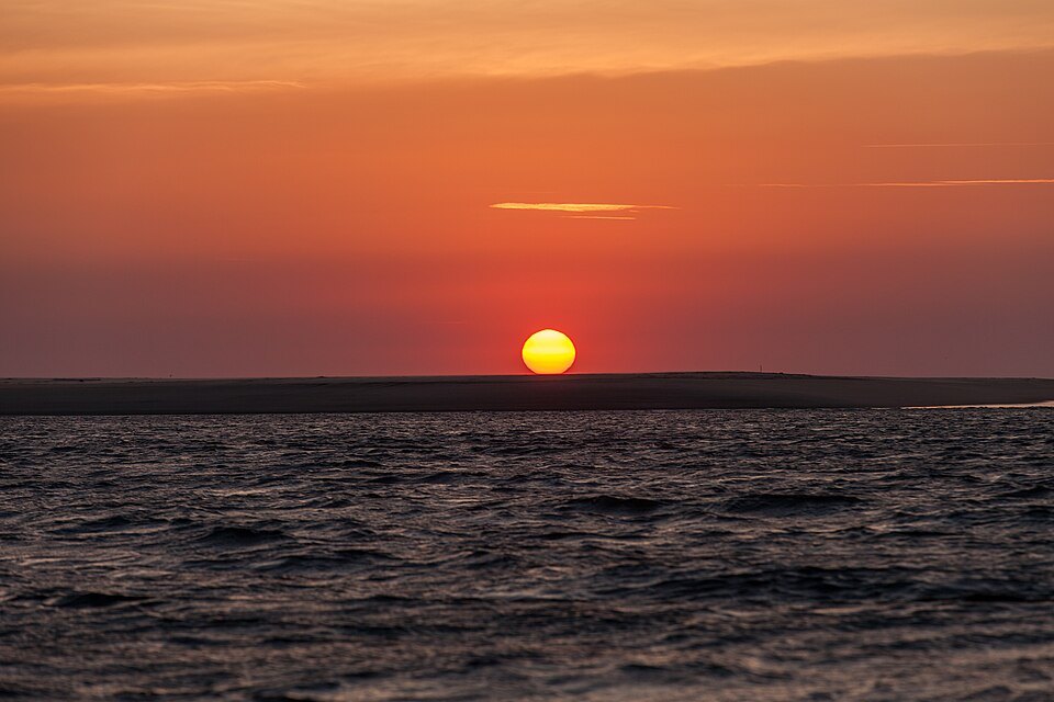 Last light settles over the water at Cap Ferret
